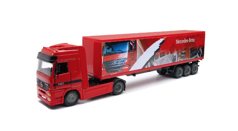 Red toy truck with Mercedes-Benz branding on a white background