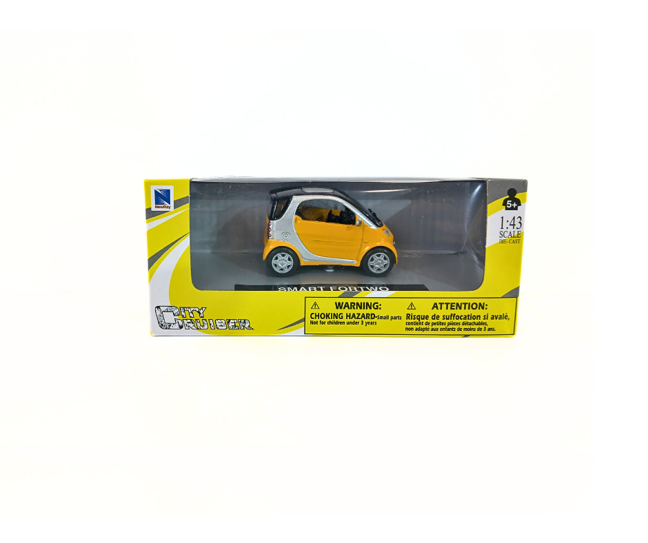 Model car in packaging with warning label on a white background