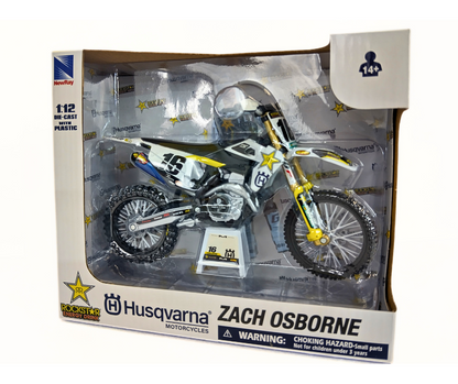 Model motorcycle in packaging with Husqvarna branding and Zach Osborne name