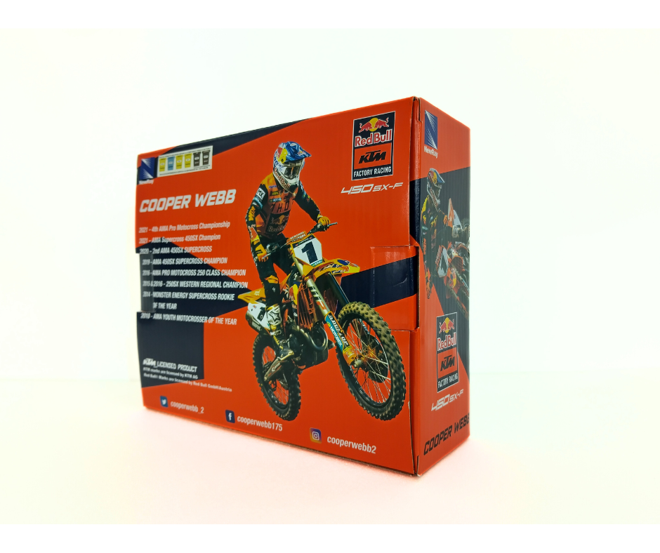 Motocross bike packaging with Cooper Webb branding on an orange background