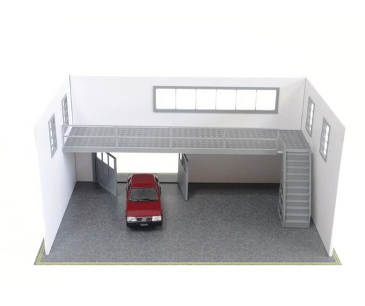 Model of a two-story house with a car parked in the garage on a white background